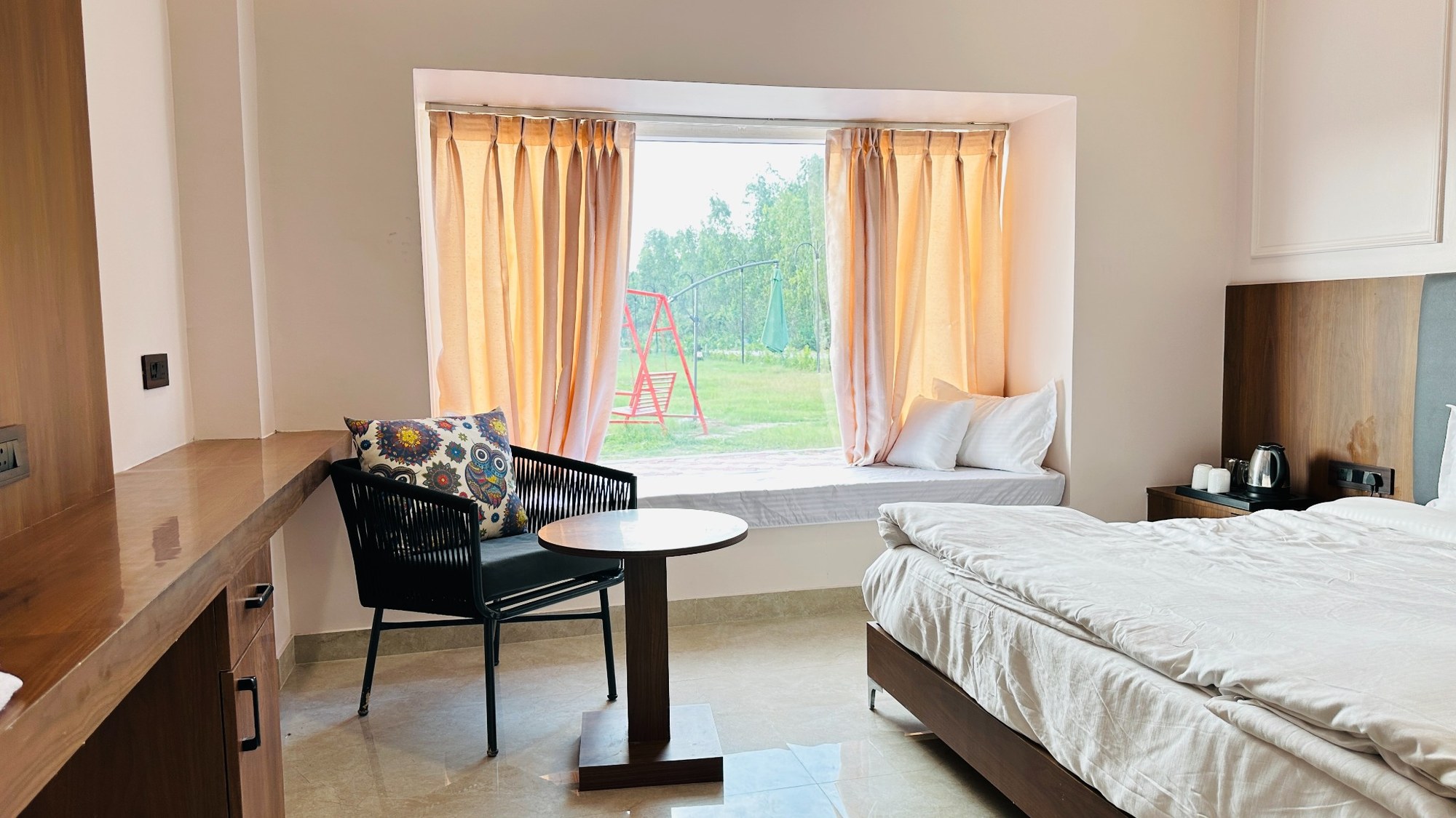 Comfortable guest room with window seating